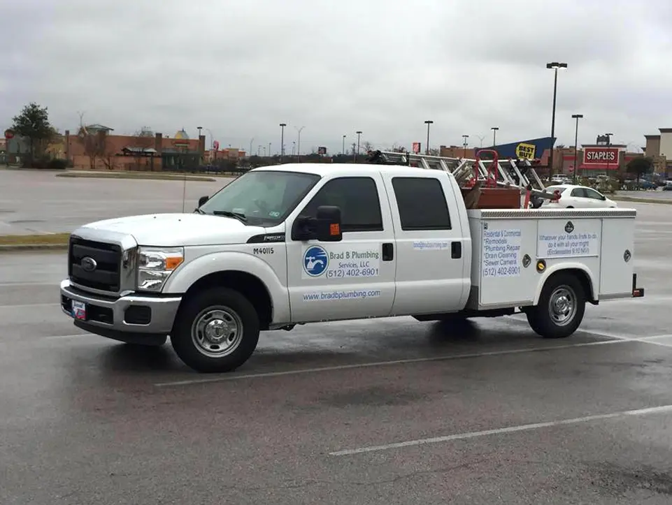 Brad B Plumbing Service LLC vehicle on the road